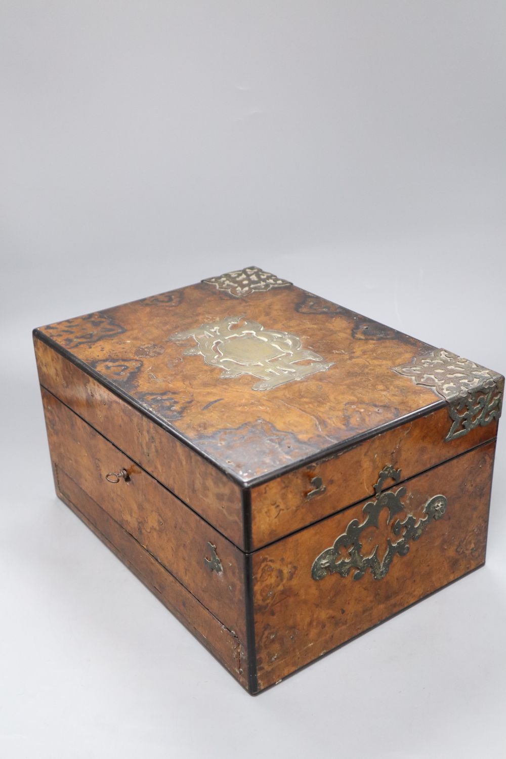 A Victorian walnut brass-mounted box